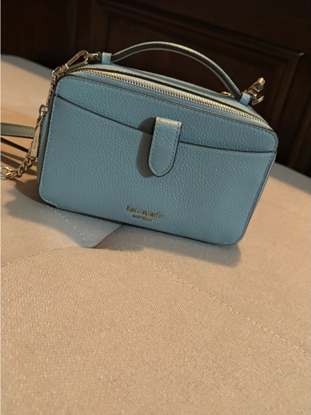 kate spade light blue pebbled leather crossbody with gold hardware